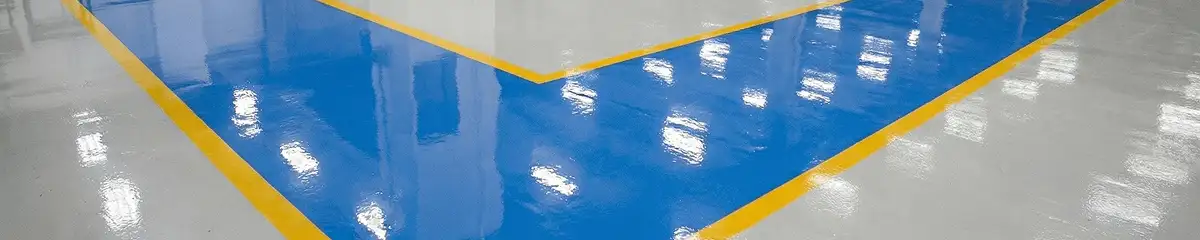 A factory floor professionally covered and marked with epoxy flooring in Newark, NJ
