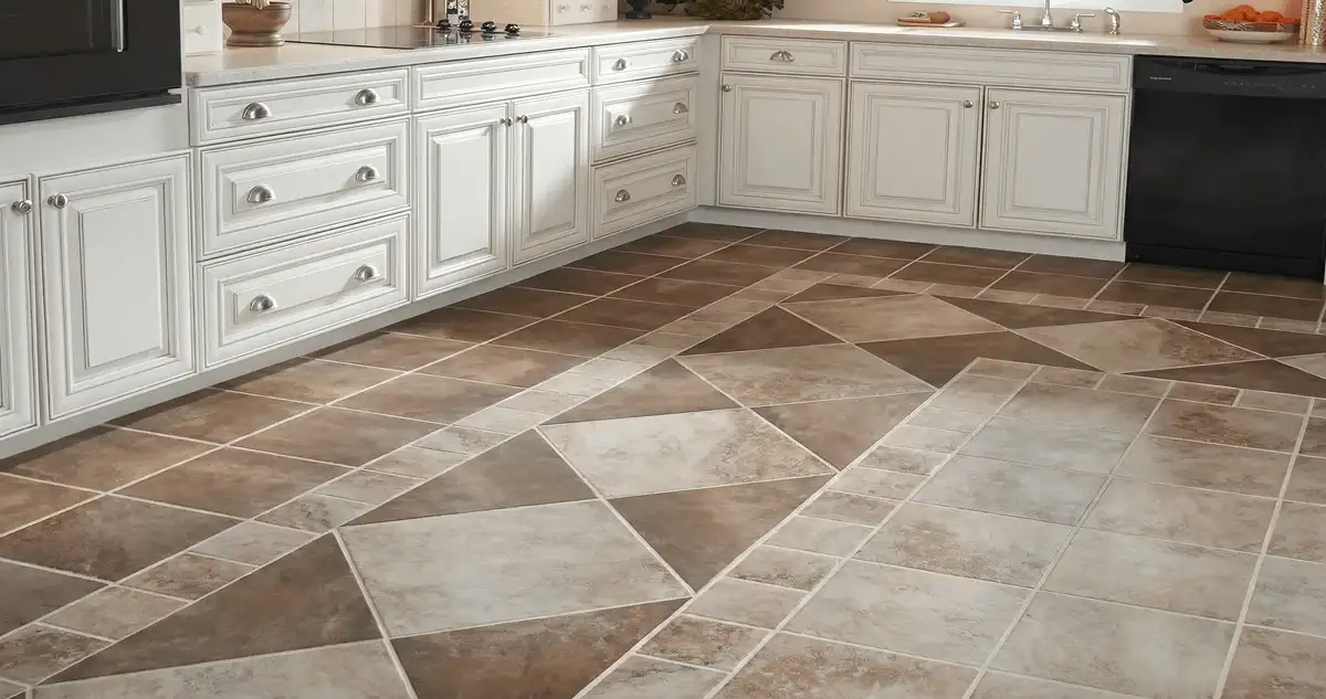 Kitchen with white cabinets and a professionally installed tile floor in Newark, NJ