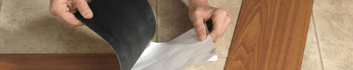 A professional installing vinyl flooring in Newark, NJ