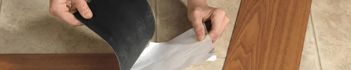 A professional installing vinyl flooring in Newark, NJ